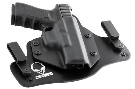 Alien gear gun holster - Jun 9, 2023 · We’ve chosen Alien Gear’s Cloak Mod holster for the Taurus TX22 Compact for a couple reasons. First, the Cloak Mod features the ability to swap between a paddle-style attachment method and ...